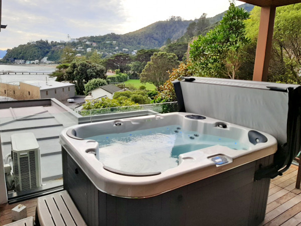 Spa pool on deck with mountain view